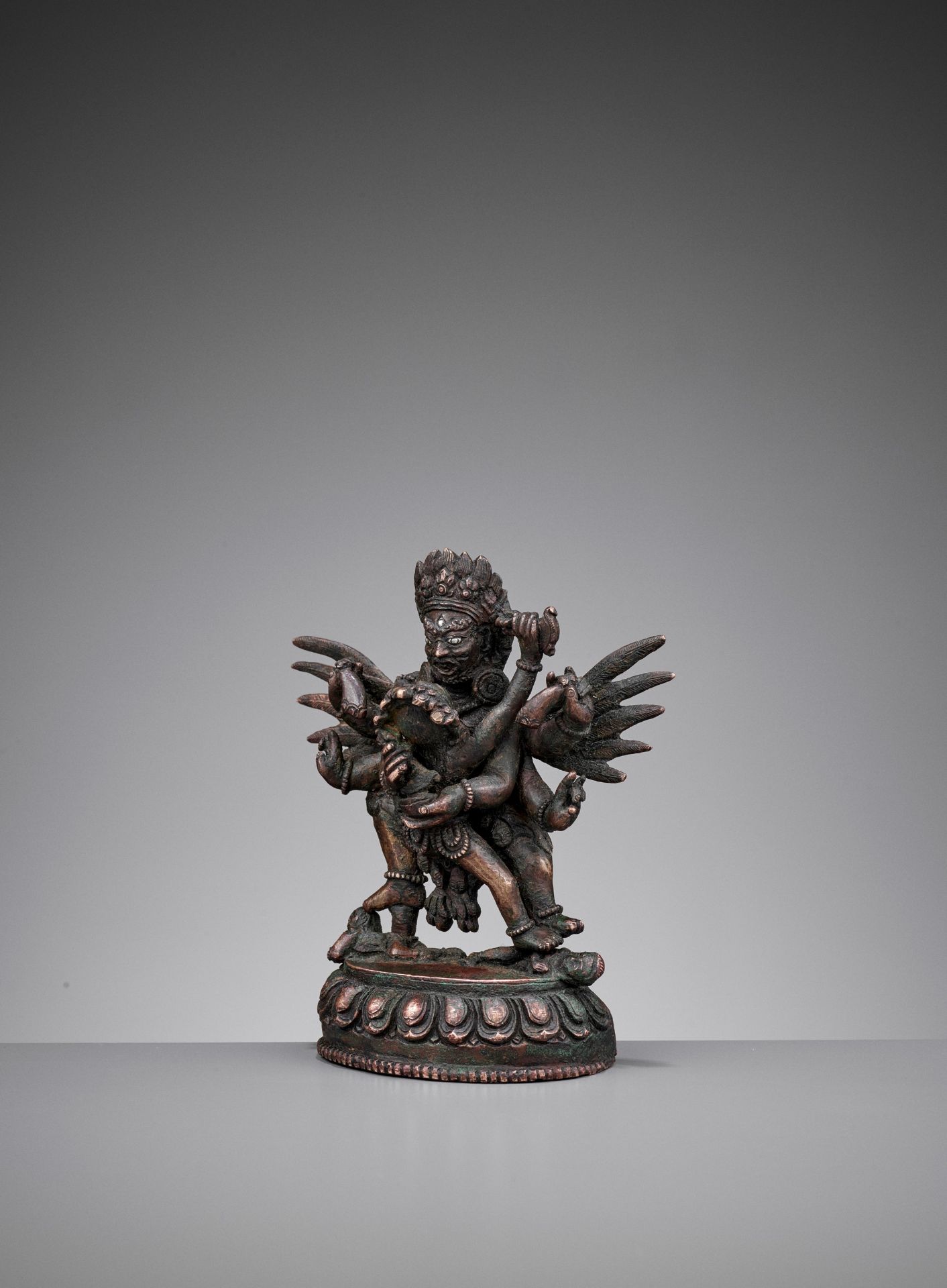 A SILVER-INLAID BRONZE FIGURE OF HERUKA AND CONSORT, QING