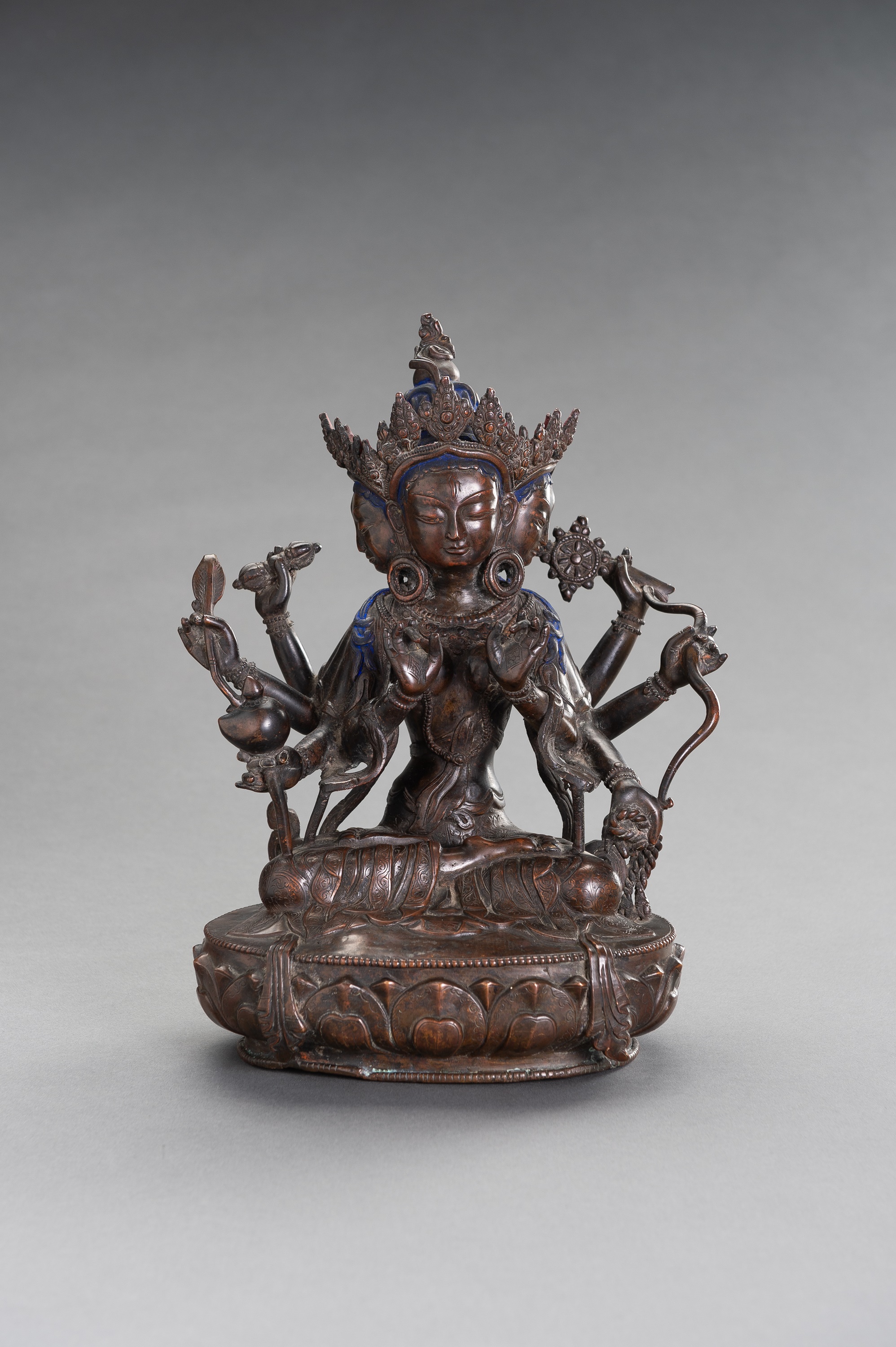 A COPPER ALLOY BRONZE FIGURE OF PRATISARA