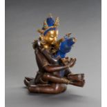 AN IMPOSING COPPER ALLOY BRONZE FIGURE OF VAJRASATTVA AND CONSORT