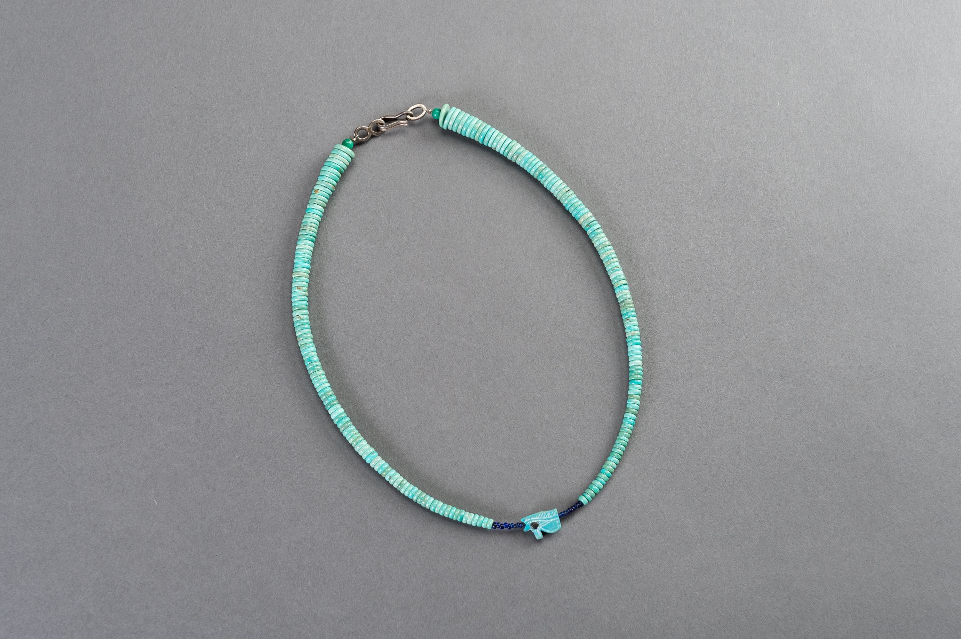 A FINE NECKLACE WITH FAIENCE EGYPTIAN UDJAT EYE AMULET