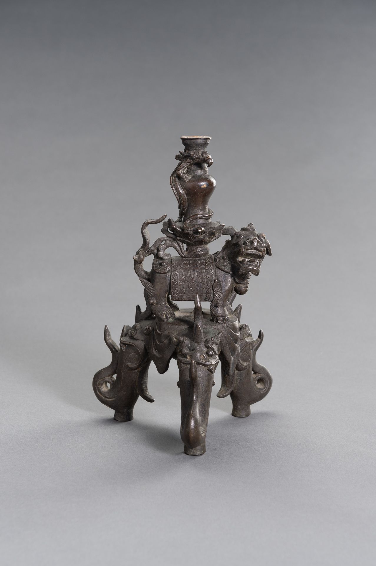 A FIGURAL CHINESE BRONZE LAMP STAND