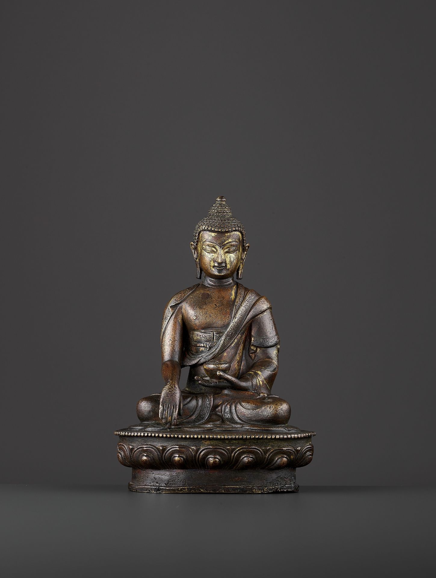 A BRONZE BUDDHA SHAKYMUNI