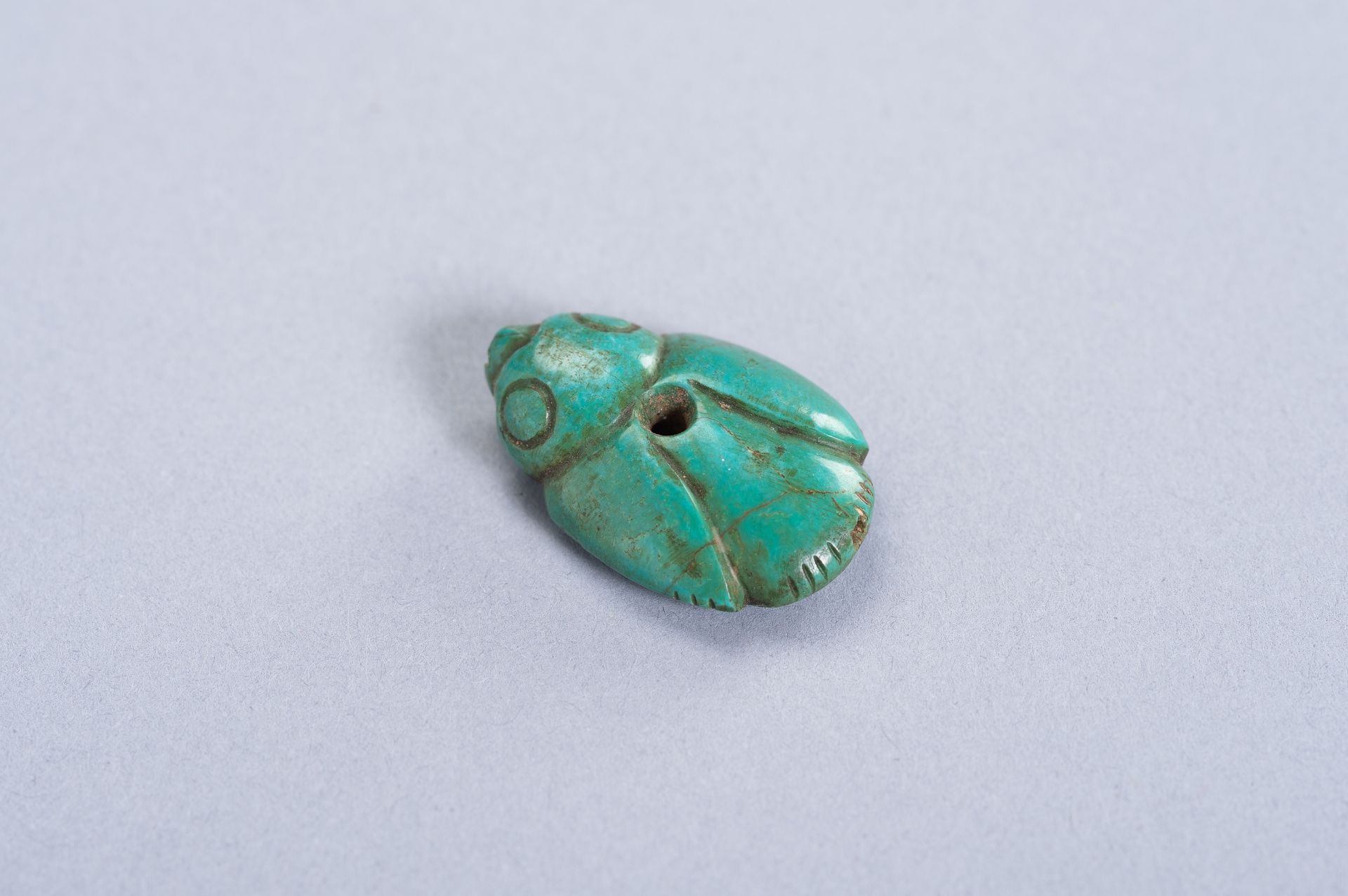 A TURQUOISE PENDANT OF A BIRD - Image 2 of 7
