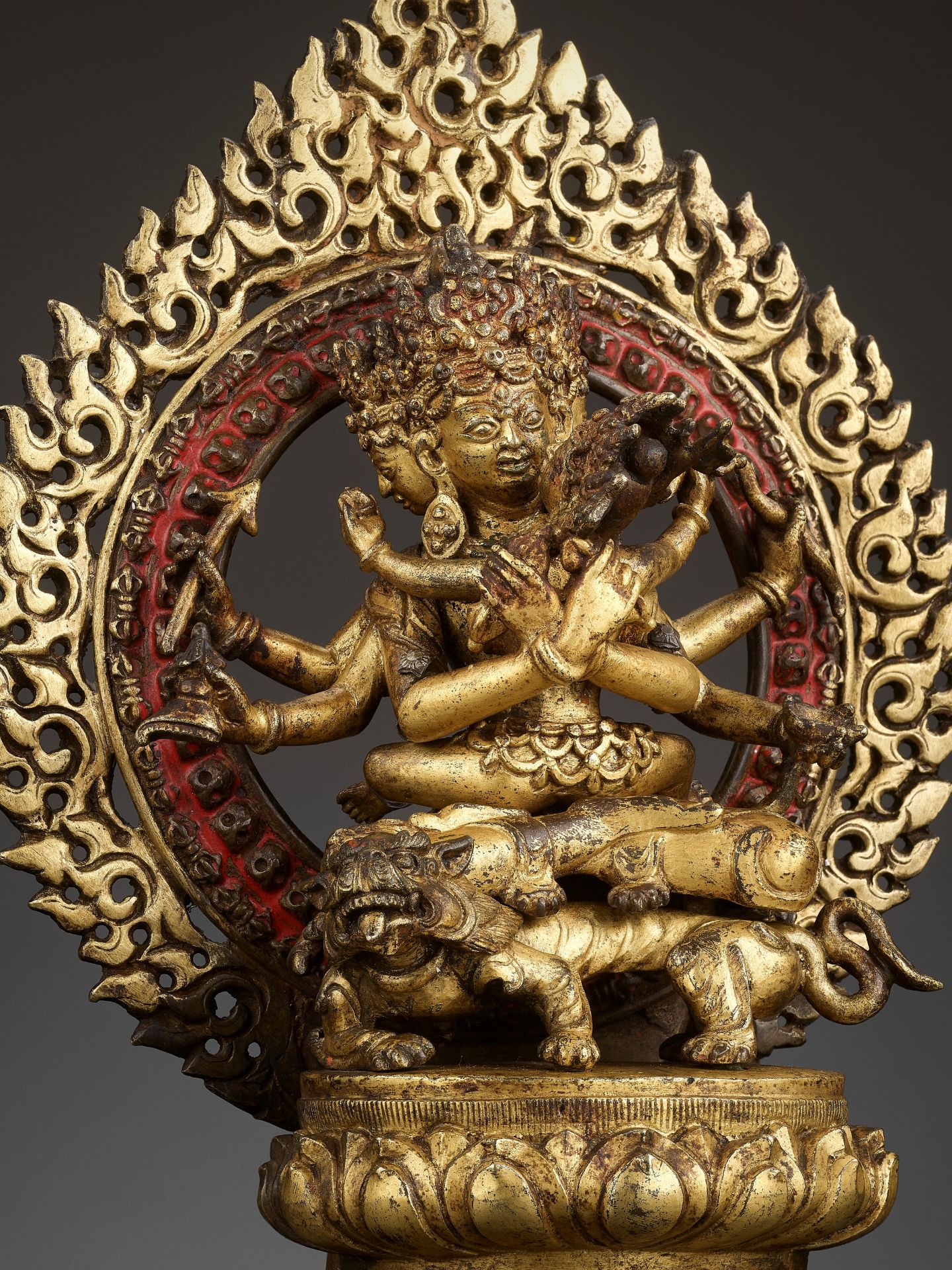 A GILT-BRONZE FIGURE OF GUHYASAMAJA IN A GILT-BRONZE SHRINE