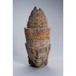 A LARGE WOOD HEAD OF BUDDHA