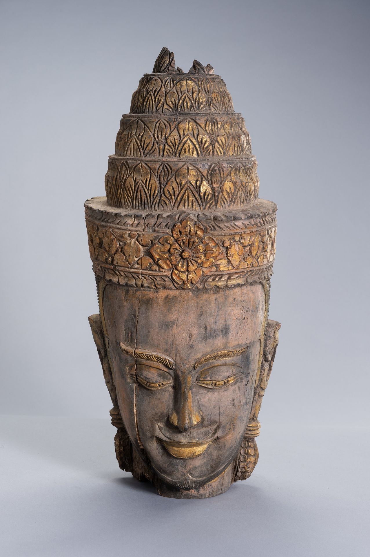 A LARGE WOOD HEAD OF BUDDHA