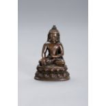 A COPPER BRONZE FIGURE OF BUDDHA SHAKYAMUNI