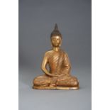 A GILT BRONZE BUDDHA