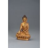 A GILT BRONZE BUDDHA