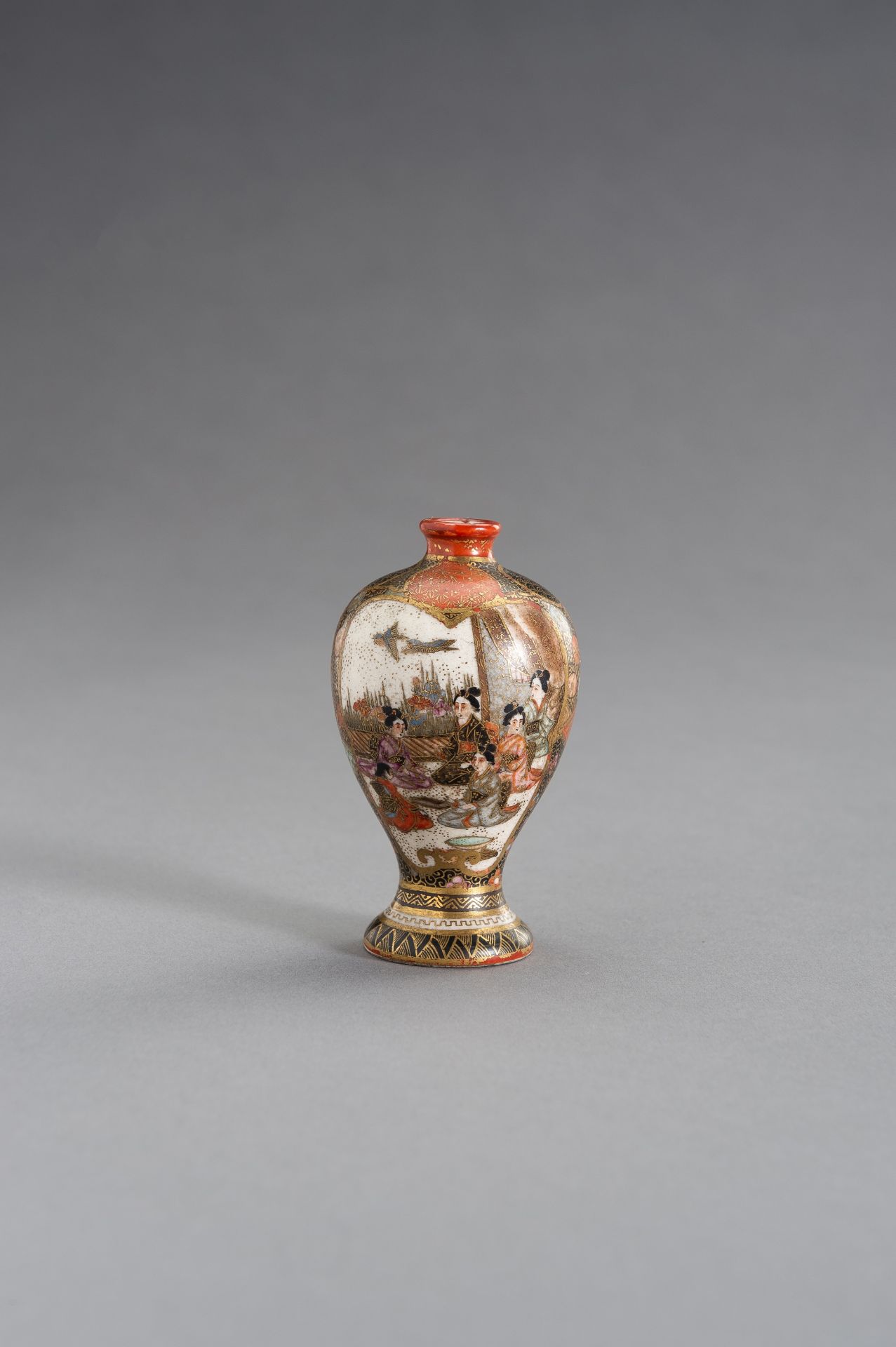 A FINE SATSUMA EARTHENWARE VASE DEPICTING COURT LADIES AND A LANDSCAPE