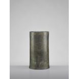 A VERY RARE AND EARLY BRONZE SUTRA CANISTER