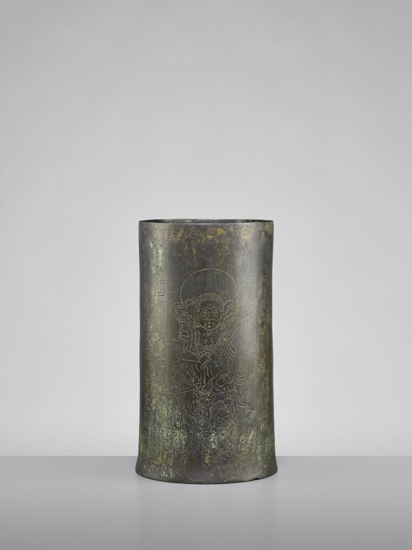 A VERY RARE AND EARLY BRONZE SUTRA CANISTER