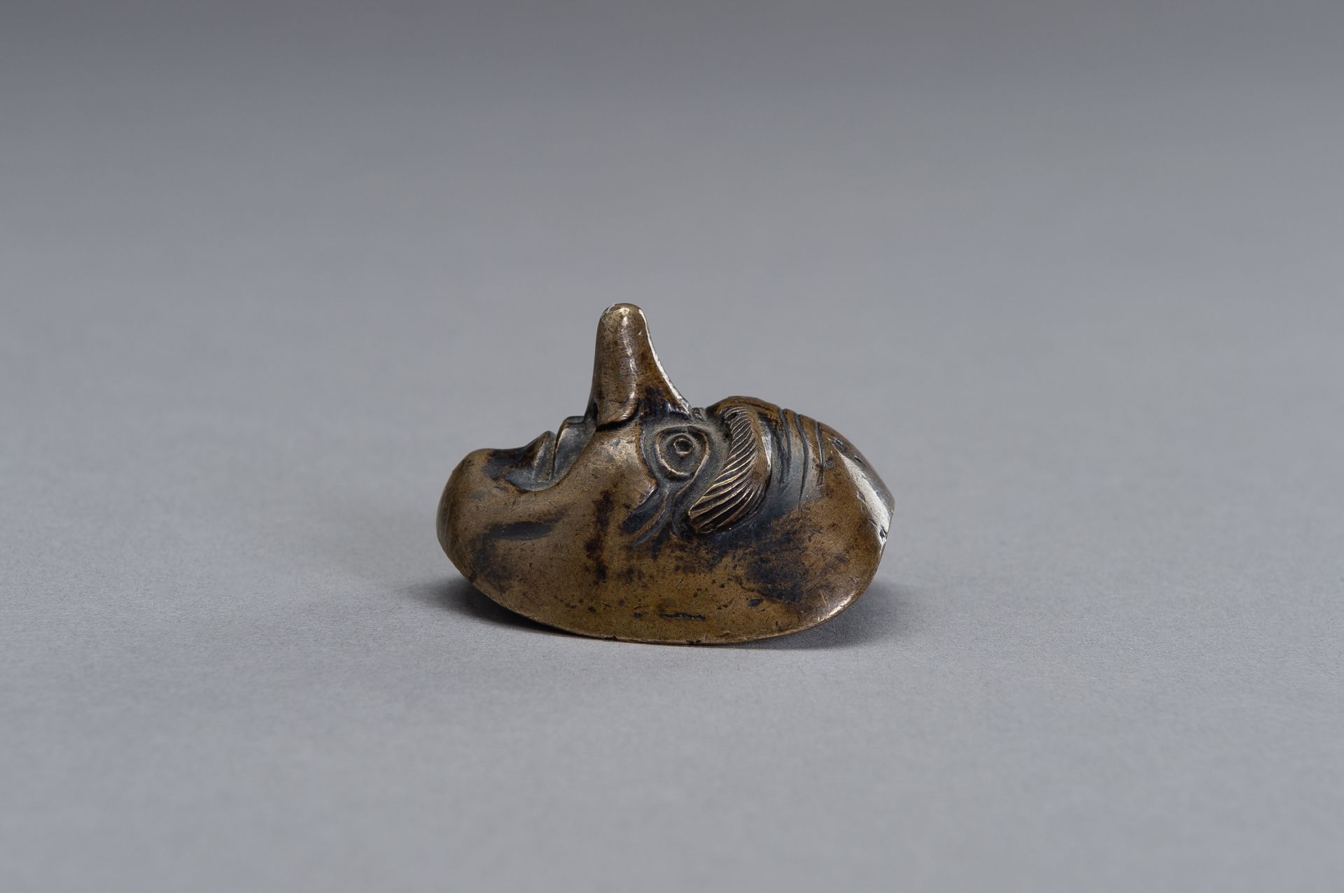 A BRONZE SCROLL WEIGHT IN THE SHAPE OF A NOH MASK - Image 7 of 9
