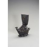 A LARGE BRONZE CENSER IN THE SHAPE OF A TREASURE SHIP