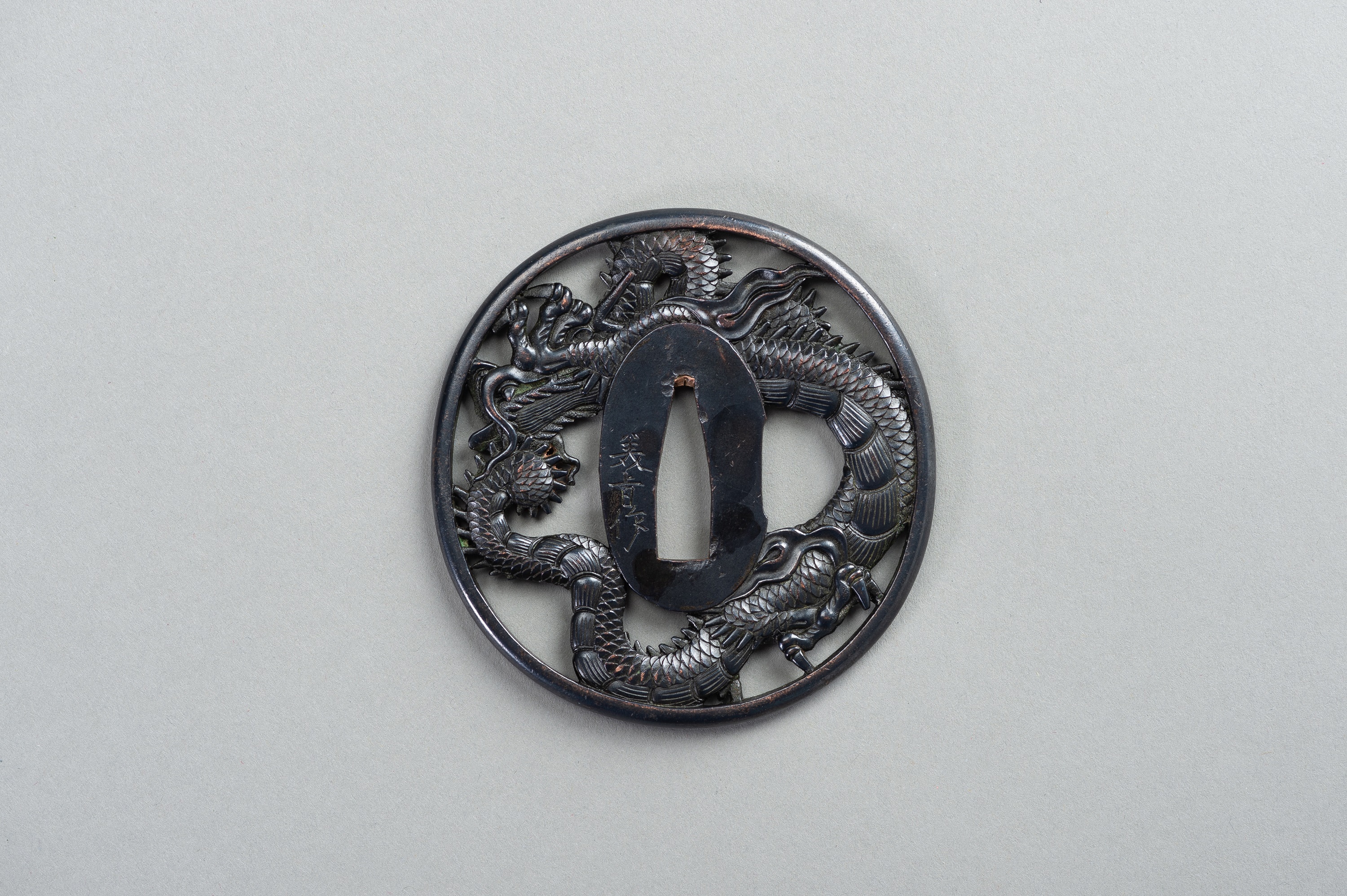 A SHAKUDO TSUBA WITH A DRAGON - Image 2 of 5