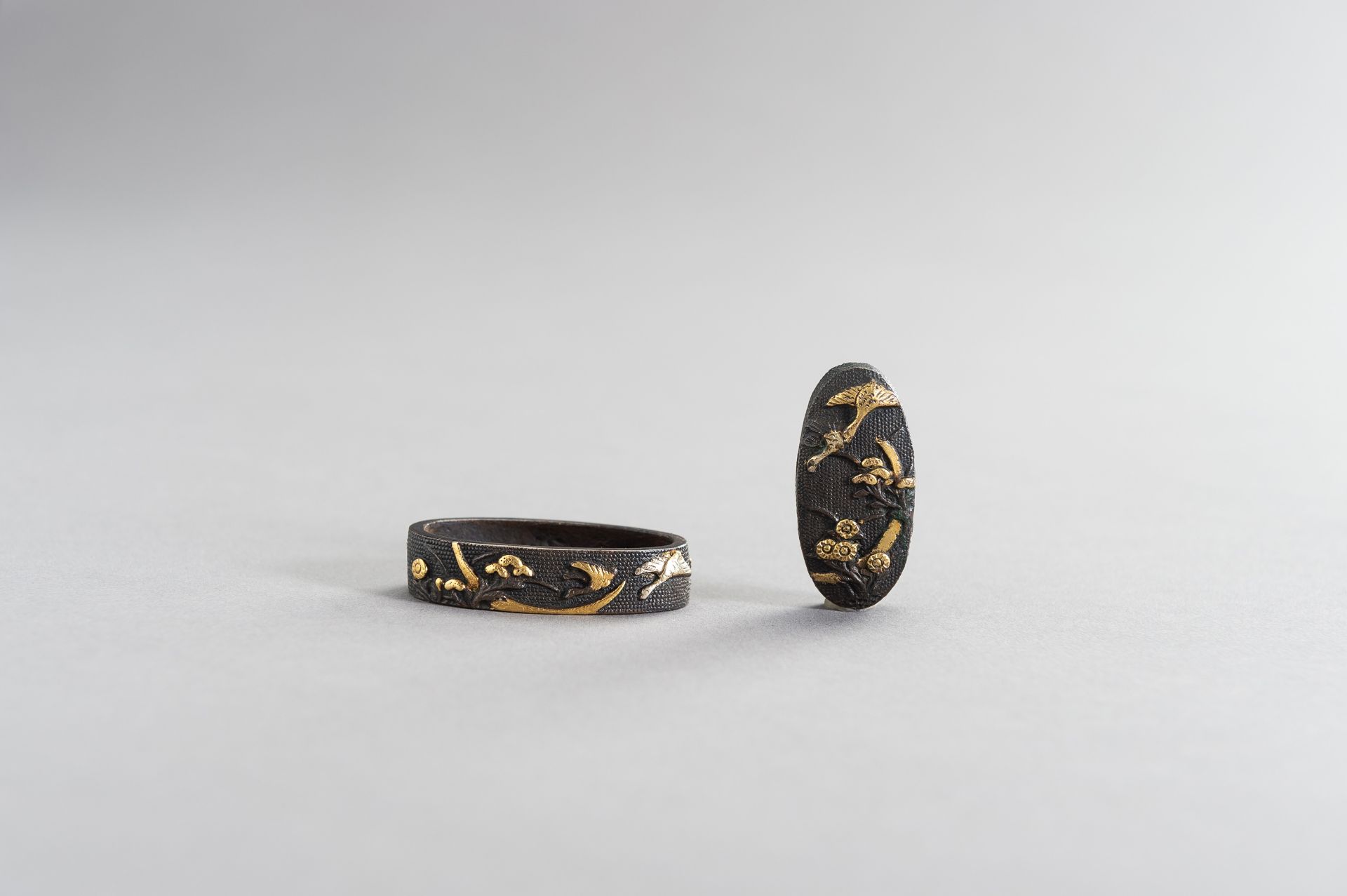 A FINE FUCHI AND KASHIRA WITH GEESE AND MOON