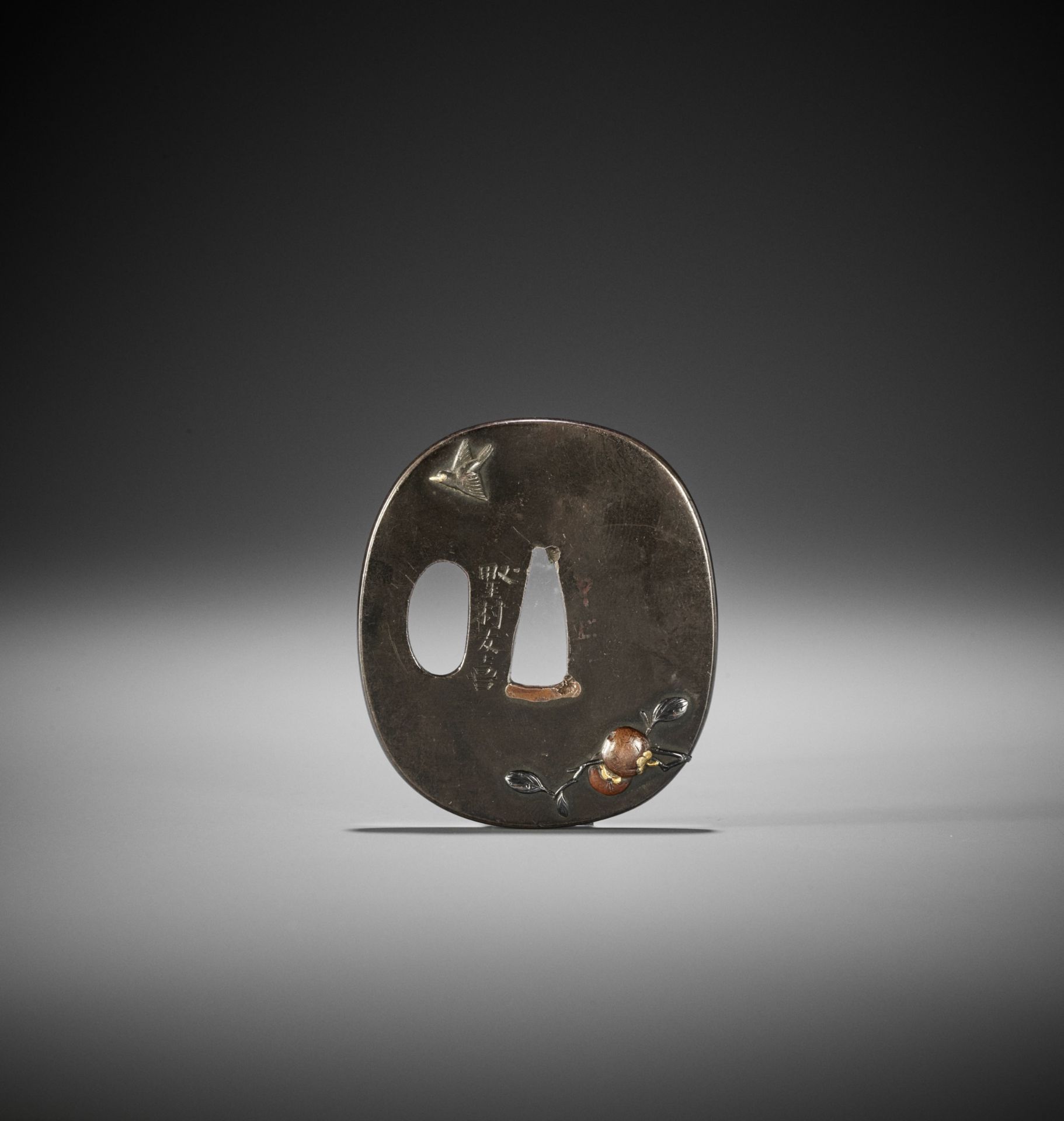 NOMURA YUKI: A SHIBUICHI TSUBA WITH BIRD AND PERSIMMONS