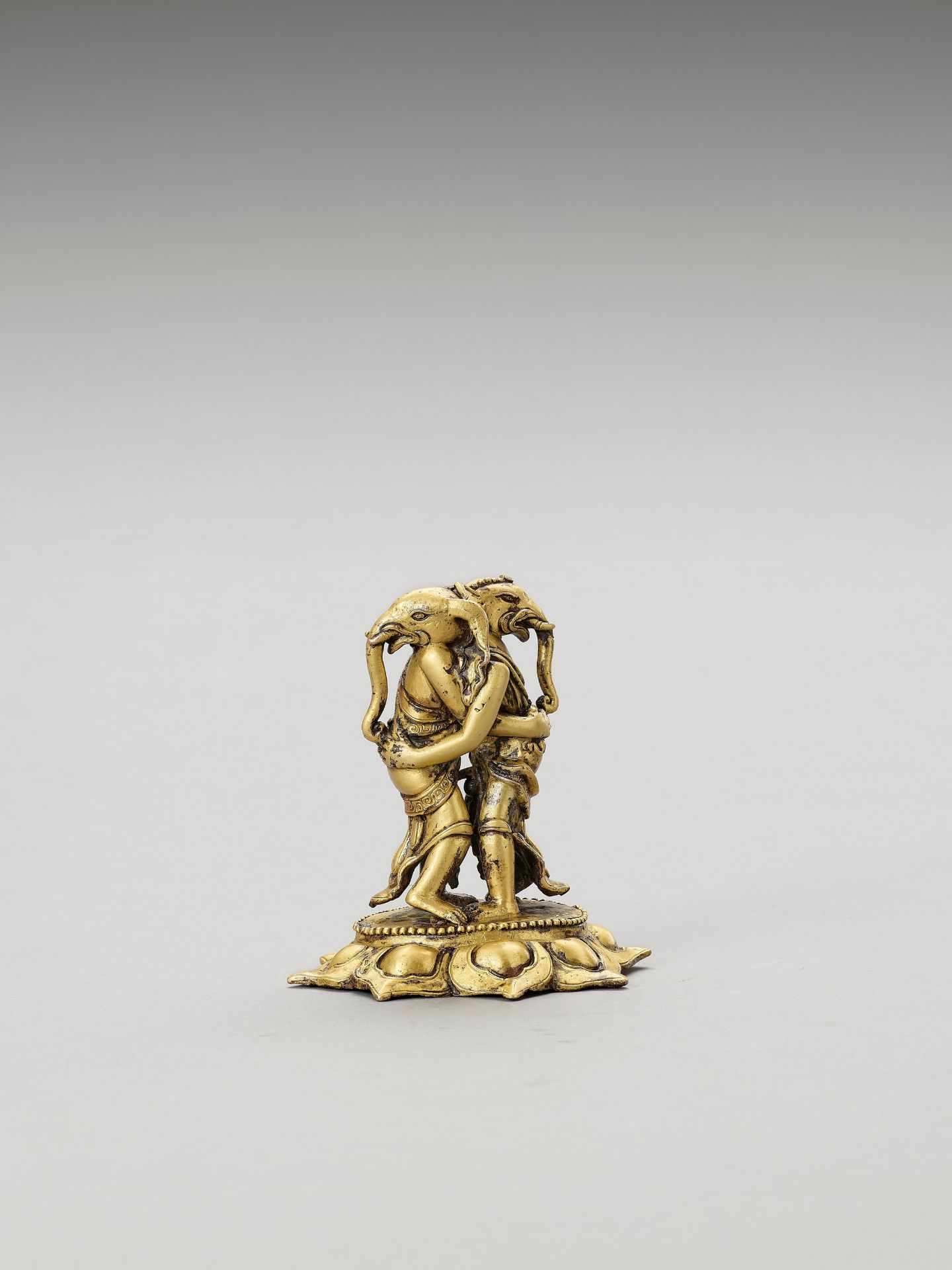 A GILT BRONZE FIGURE OF TWO ELEPHANT HEADED DEITIES, KANGITEN