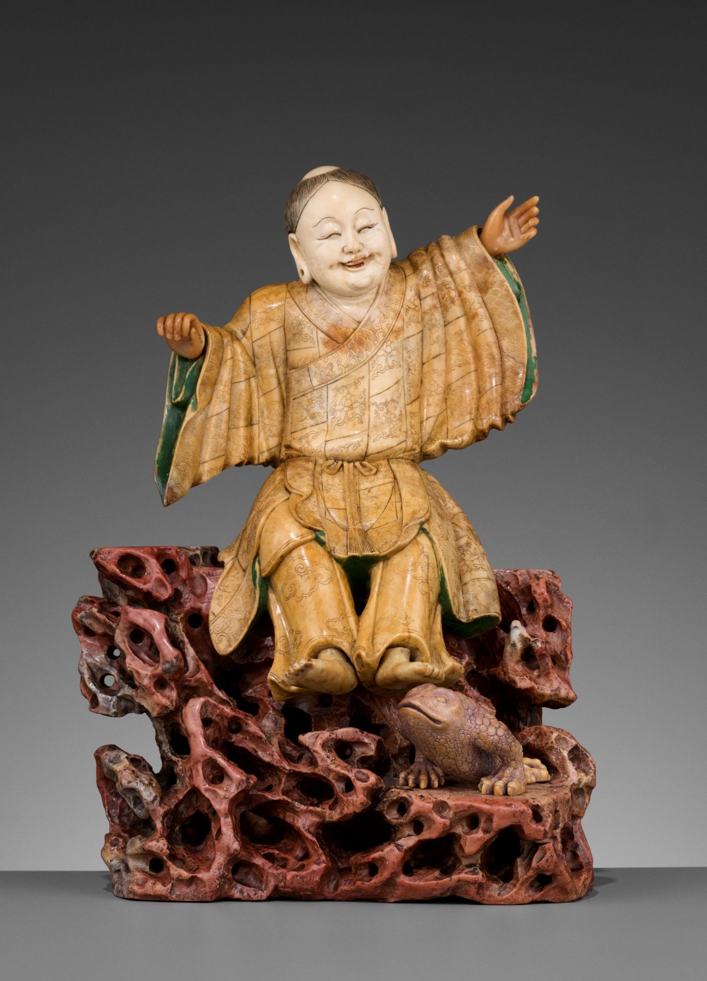 A LARGE SOAPSTONE FIGURE OF LIU HAI, 17TH CENTURY