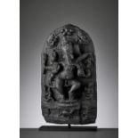 A BLACK STONE STELE OF GANESHA, PALA PERIOD