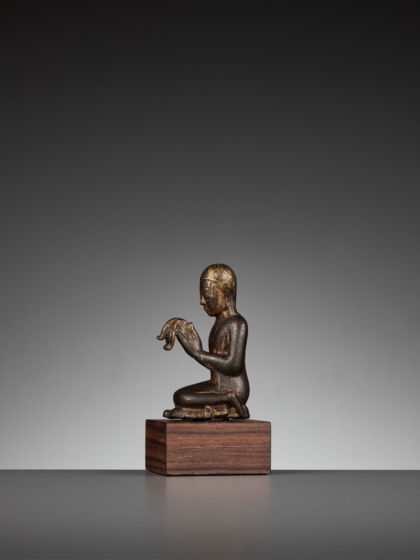 A SMALL BRONZE OF A WORSHIPPER, SHAN STATE