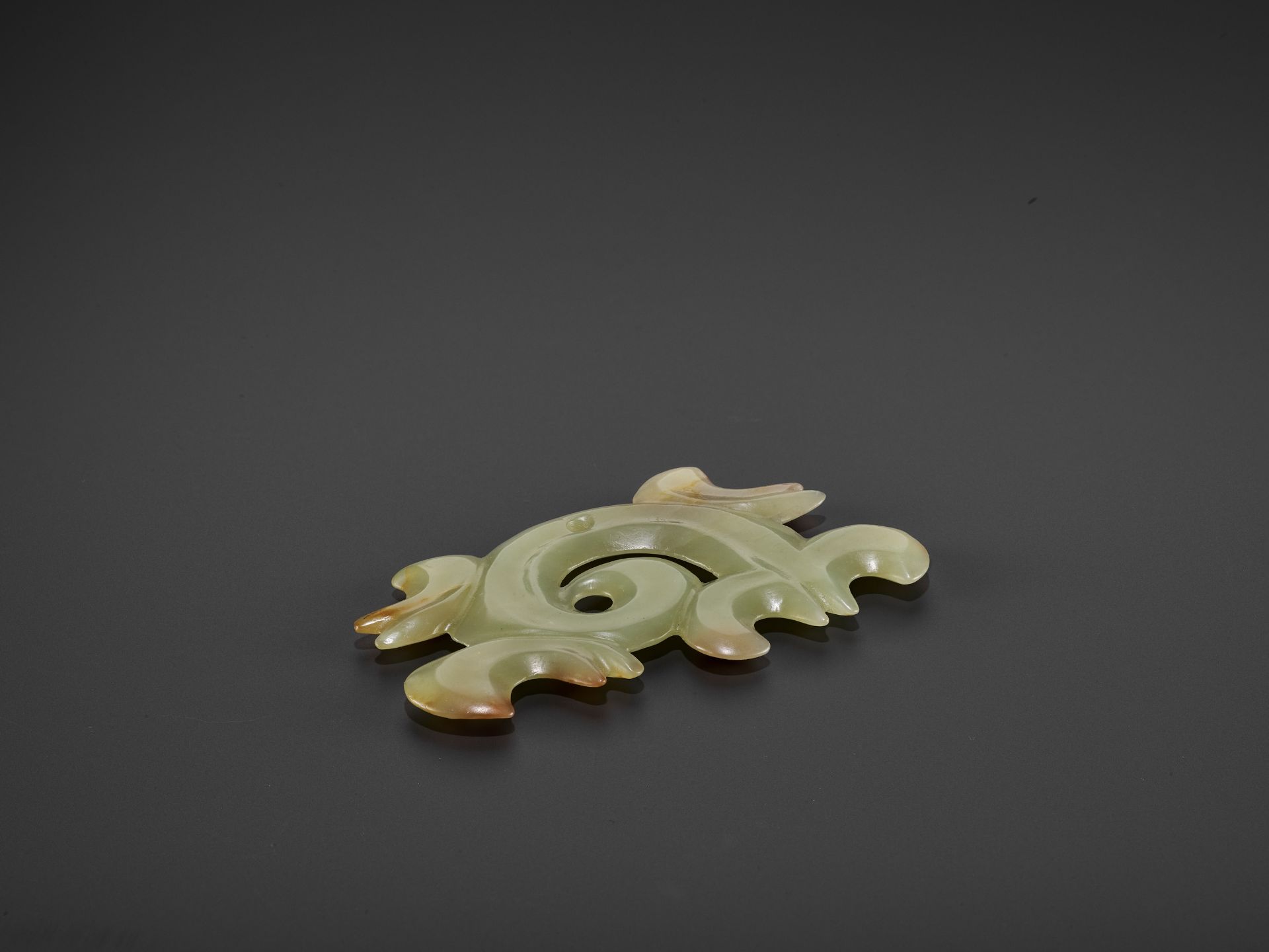 A RARE YELLOW AND RUSSET JADE 'CLOUD-SCROLL' PENDANT, HONGSHAN CULTURE - Image 7 of 10