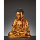 A MASSIVE GILT-LACQUERED WOOD FIGURE OF BUDDHA, 18TH-19TH CENTURY