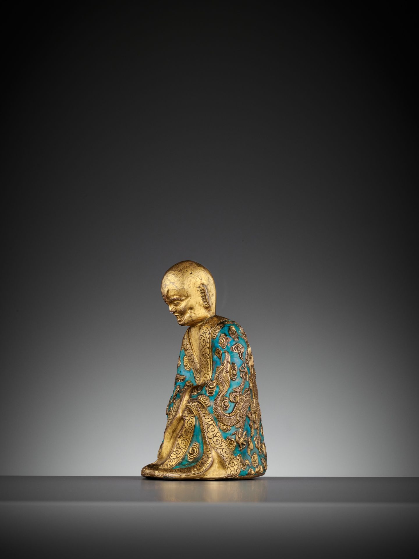 AN ENAMELED GILT-COPPER REPOUSSE LUOHAN, QIANLONG MARK AND PERIOD - Image 5 of 12