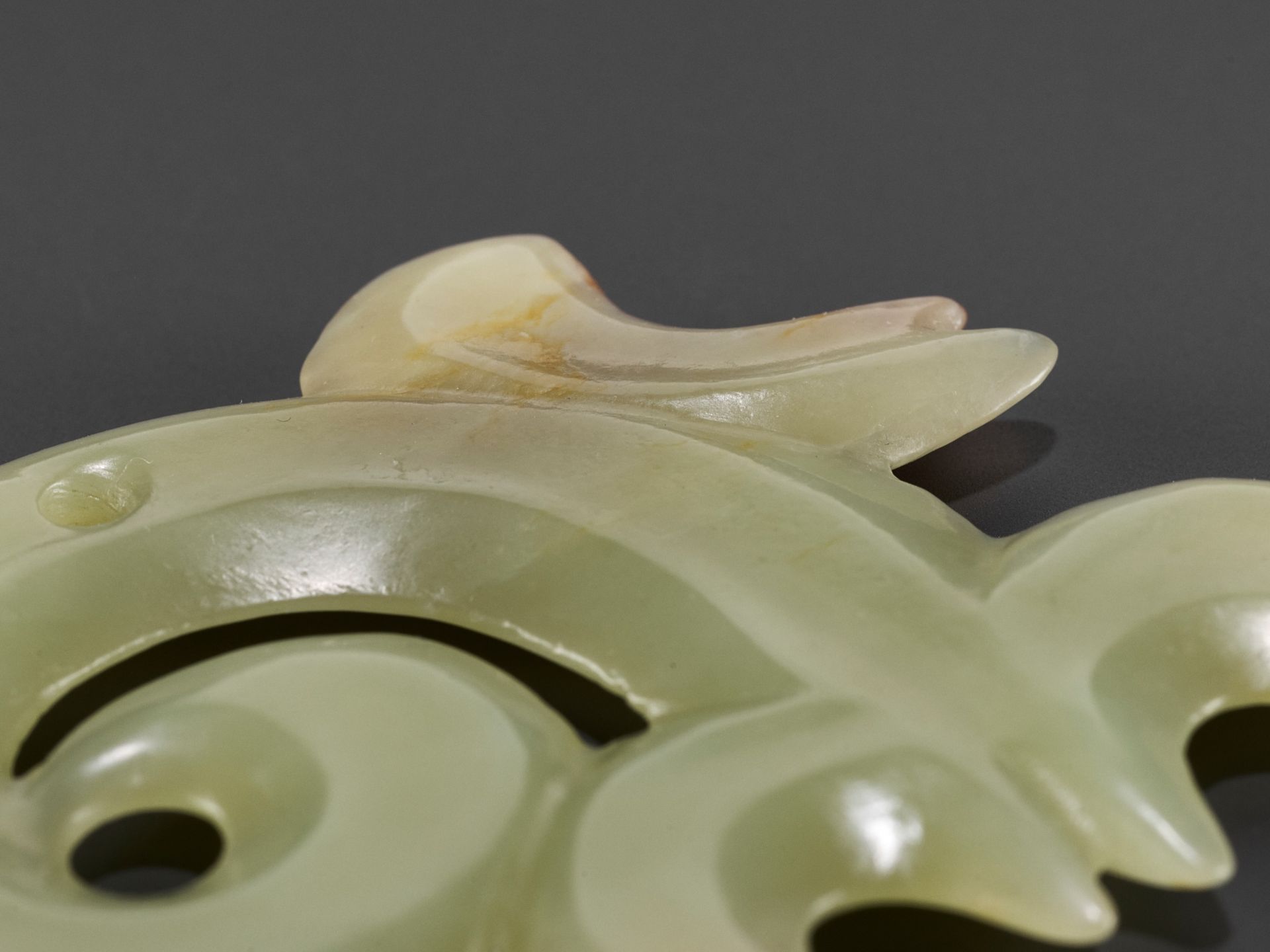 A RARE YELLOW AND RUSSET JADE 'CLOUD-SCROLL' PENDANT, HONGSHAN CULTURE - Image 8 of 10