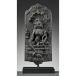 A RARE BLACK STONE STELE DEPICTING MANASA, PALA PERIOD