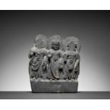 A GRAY SCHIST RELIEF OF BUDDHA AND TWO BODHISATTVAS, GANDHARA