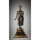 A MONUMENTAL LACQUER-GILT BRONZE FIGURE OF BUDDHA, AYUTTHAYA KINGDOM