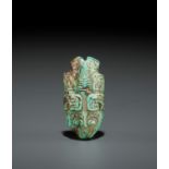 A TURQUOISE BEAD DEPICTING A CICADA, SHANG TO WESTERN ZHOU DYNASTY