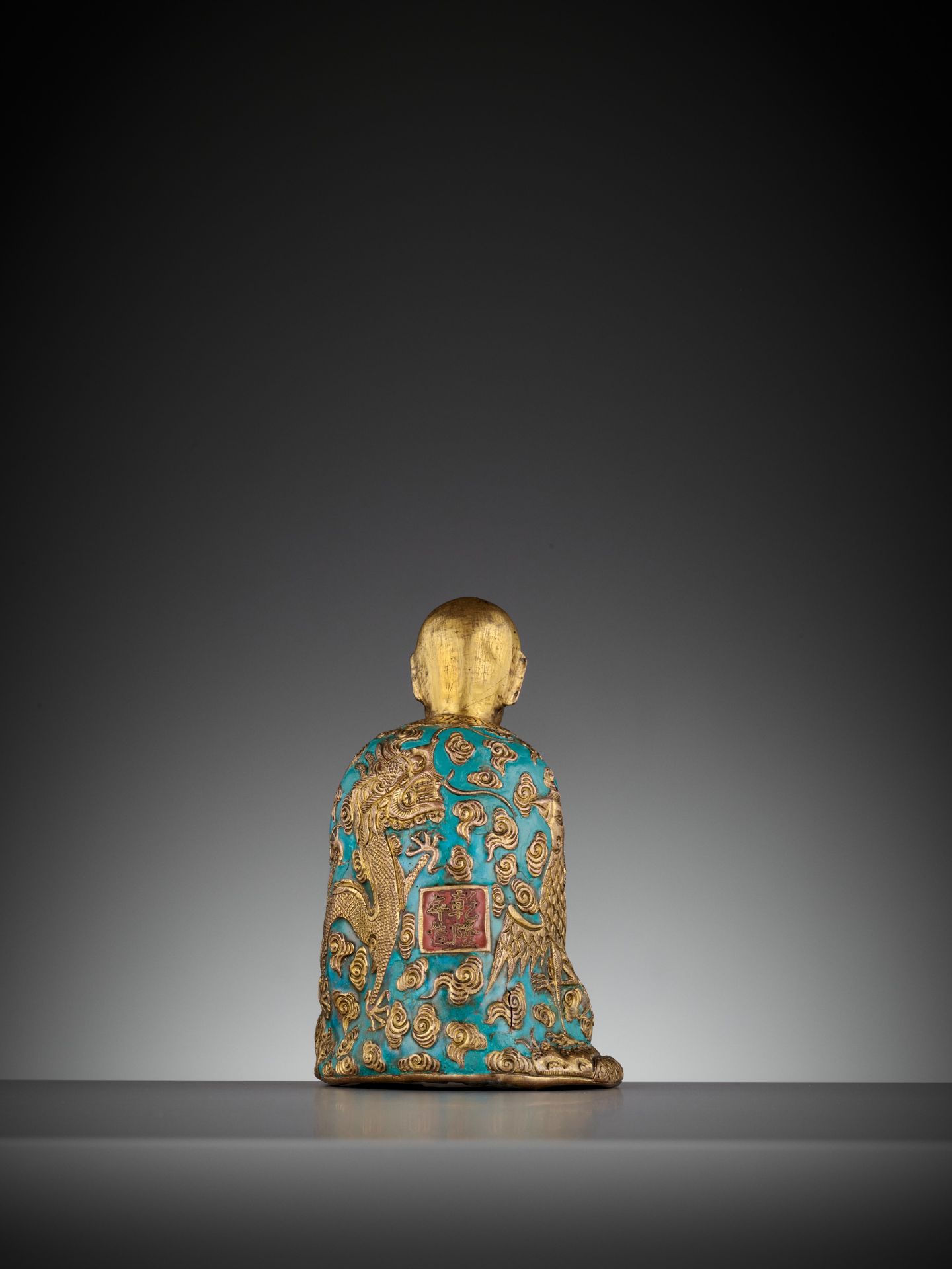 AN ENAMELED GILT-COPPER REPOUSSE LUOHAN, QIANLONG MARK AND PERIOD - Image 7 of 12