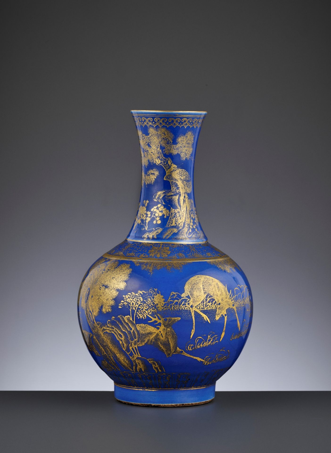 A POWDER-BLUE-GROUND GILT-DECORATED 'DEER AND CRANE' BOTTLE VASE, GUANGXU MARK AND PERIOD