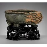 A LARGE DUAN STONE 'LOTUS POND' BASIN, QING DYNASTY