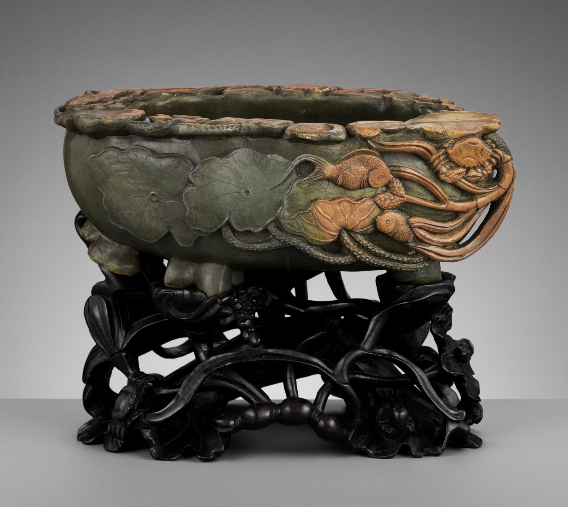 A LARGE DUAN STONE 'LOTUS POND' BASIN, QING DYNASTY