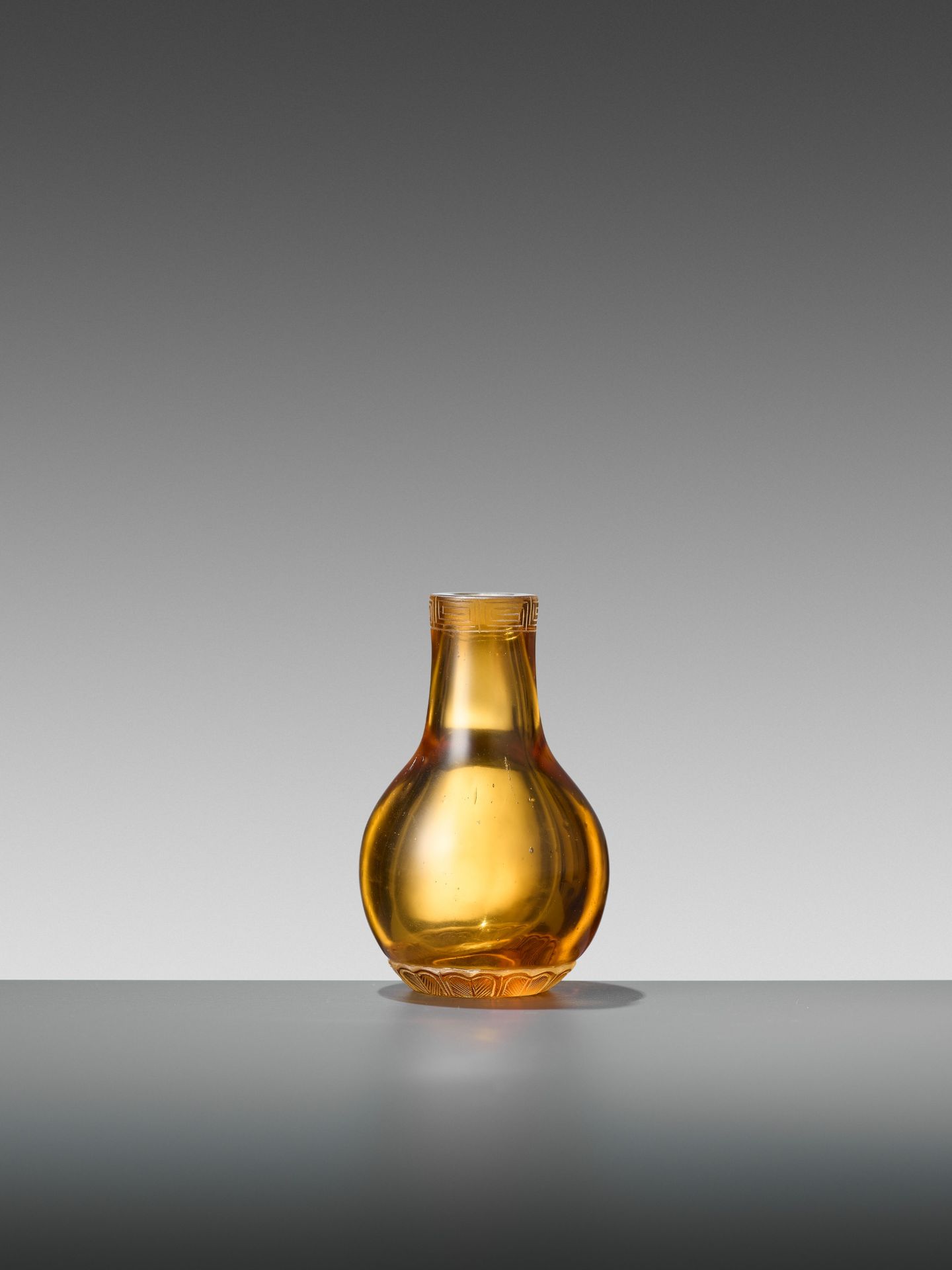 AN AMBER GLASS MINIATURE BOTTLE VASE, TONGZHI MARK AND PERIOD