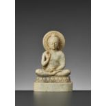 A SOAPSTONE FIGURE OF BUDDHA SHAKYAMUNI