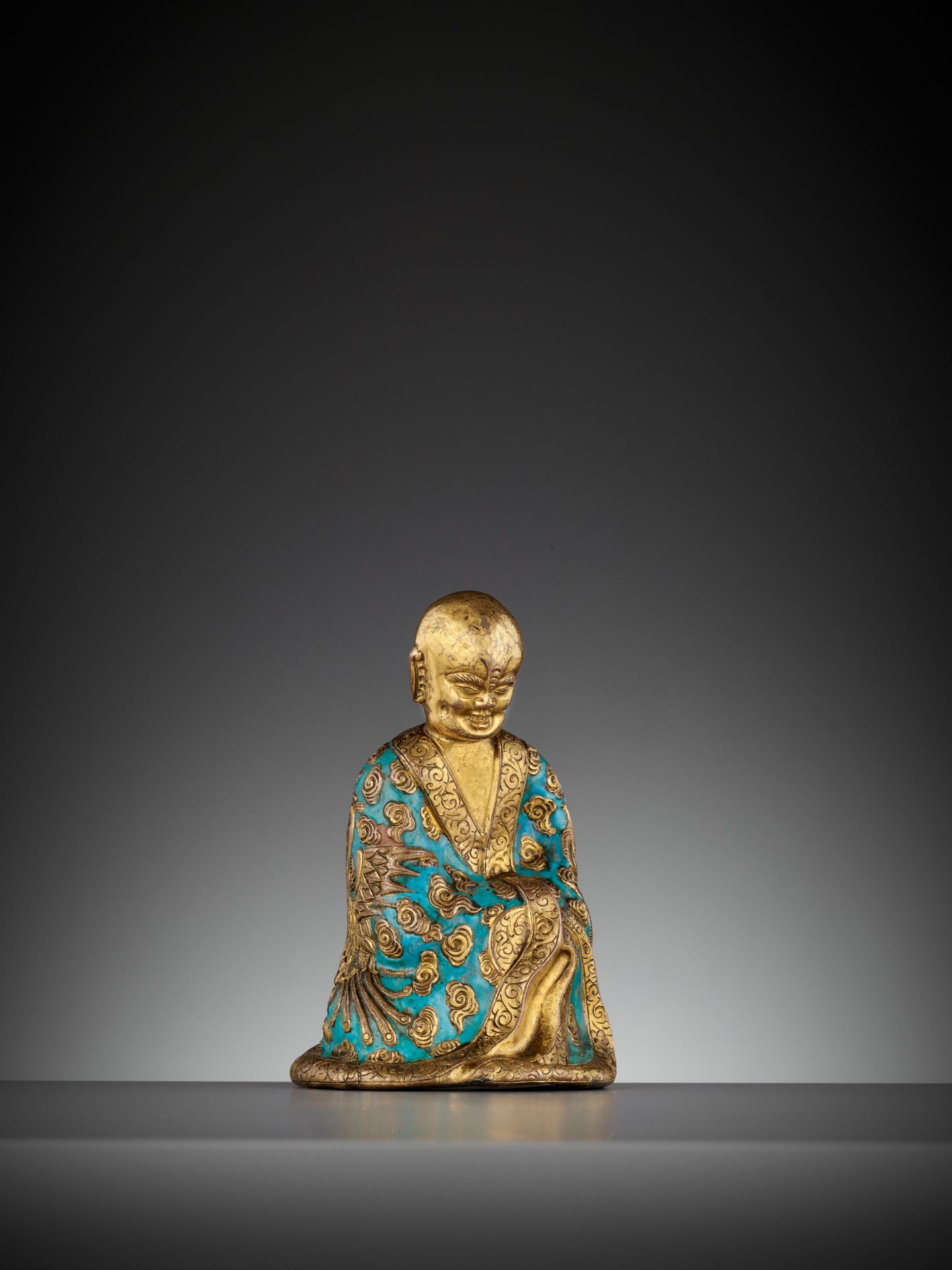 AN ENAMELED GILT-COPPER REPOUSSE LUOHAN, QIANLONG MARK AND PERIOD - Image 10 of 12