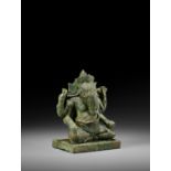 A BRONZE FIGURE OF GANESHA, BAYON STYLE