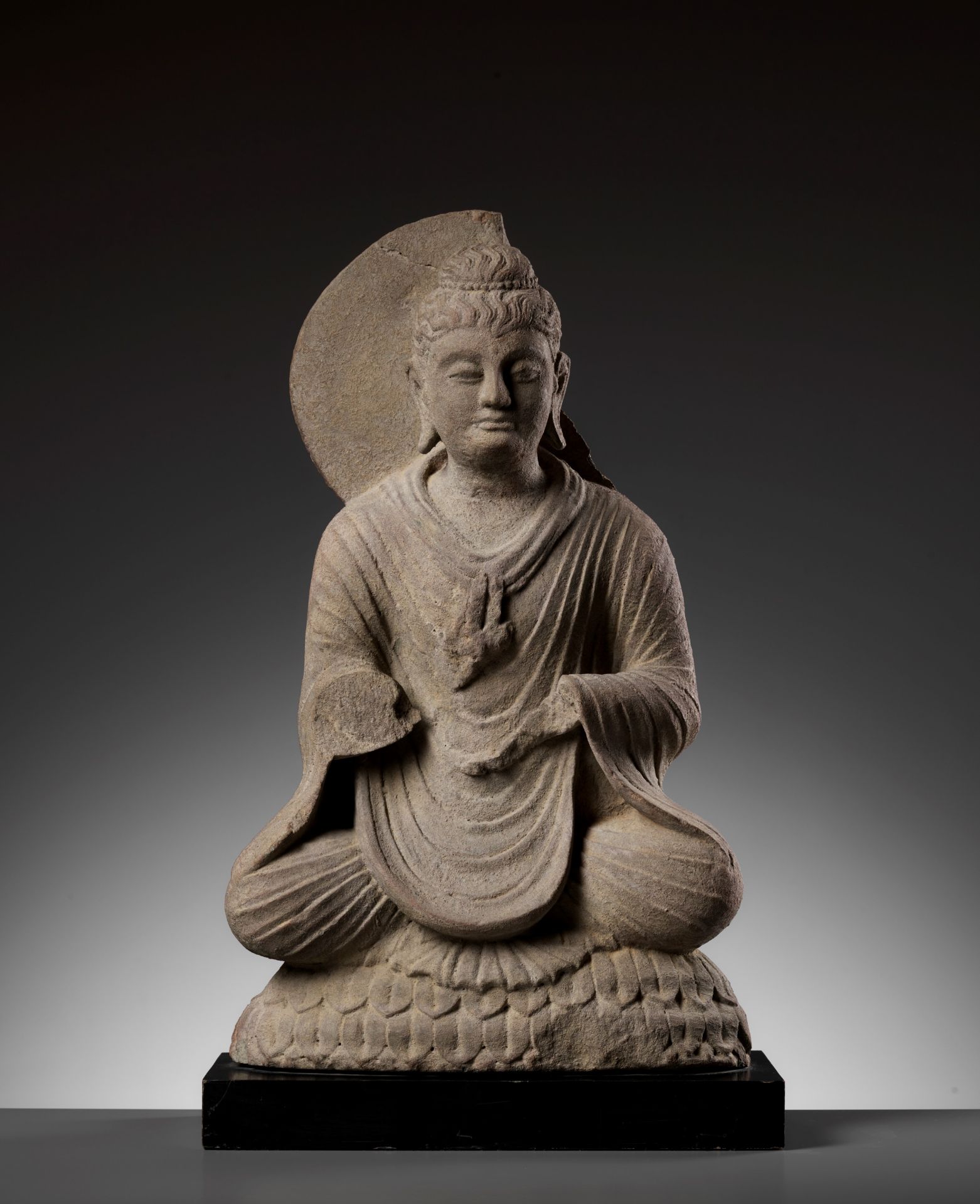 A GRAY SCHIST FIGURE OF BUDDHA AS A TEACHER, GANDHARA