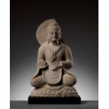 A GRAY SCHIST FIGURE OF BUDDHA AS A TEACHER, GANDHARA