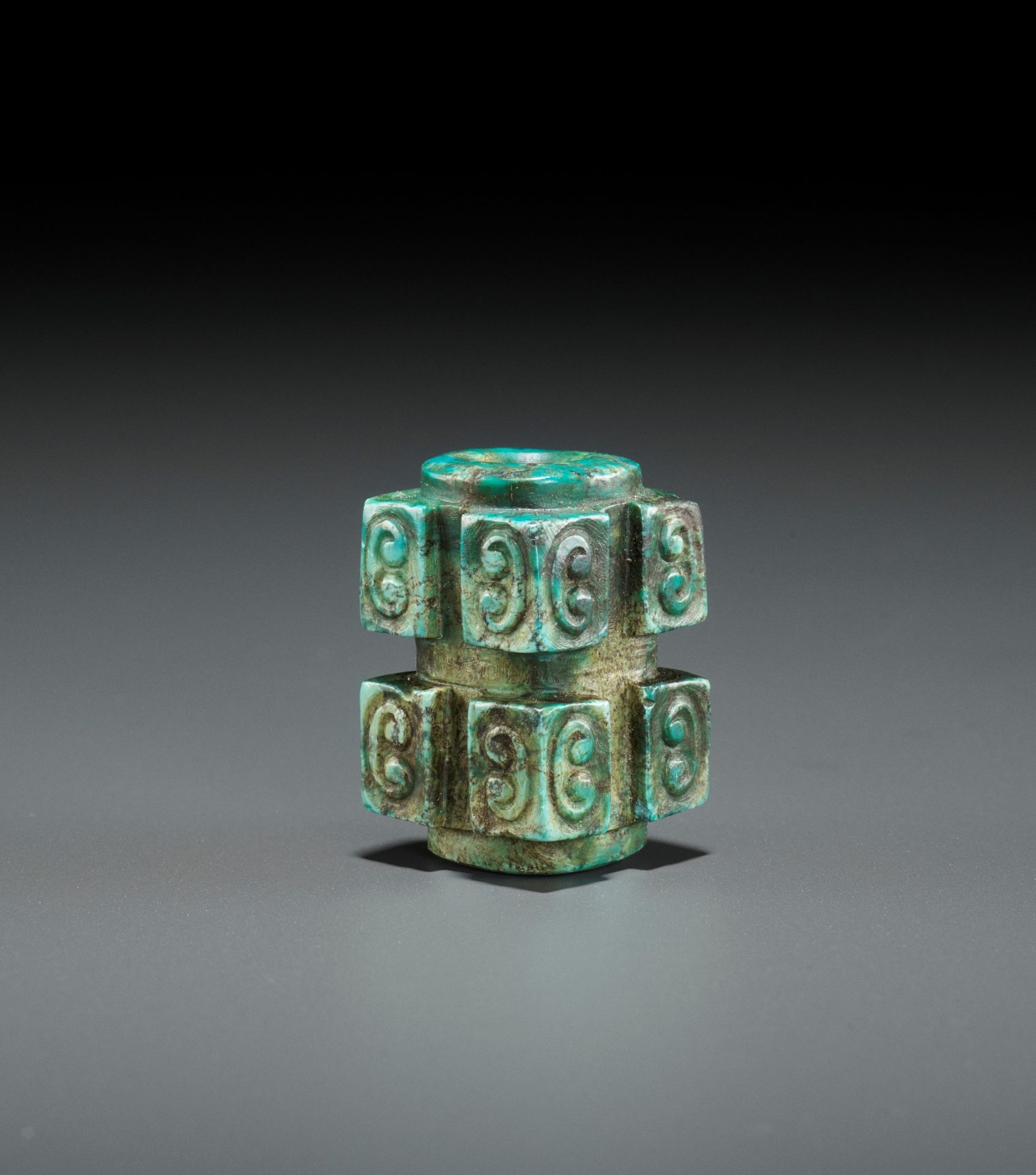 A TURQUOISE CONG-FORM BEAD, SHANG TO WESTERN ZHOU DYNASTY