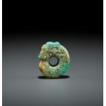 A TURQUOISE MATRIX 'PIG-DRAGON' PENDANT, SHANG TO WESTERN ZHOU DYNASTY
