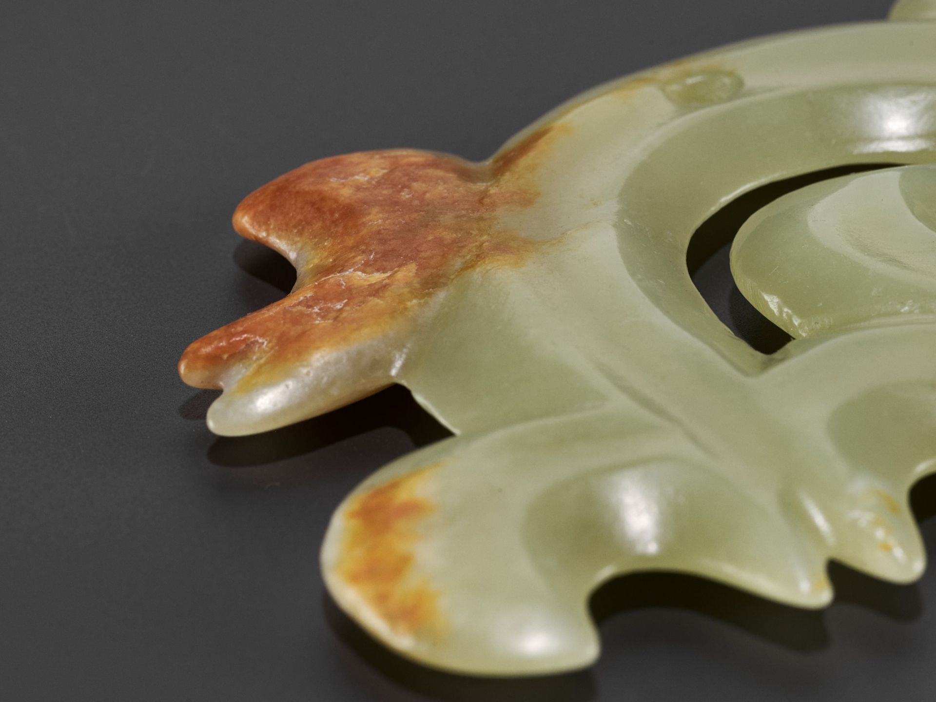 A RARE YELLOW AND RUSSET JADE 'CLOUD-SCROLL' PENDANT, HONGSHAN CULTURE - Image 6 of 10