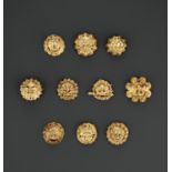 A SET OF TEN GILT SILVER REPOUSSE HORSE-TACK ORNAMENTS, MING OR EARLIER