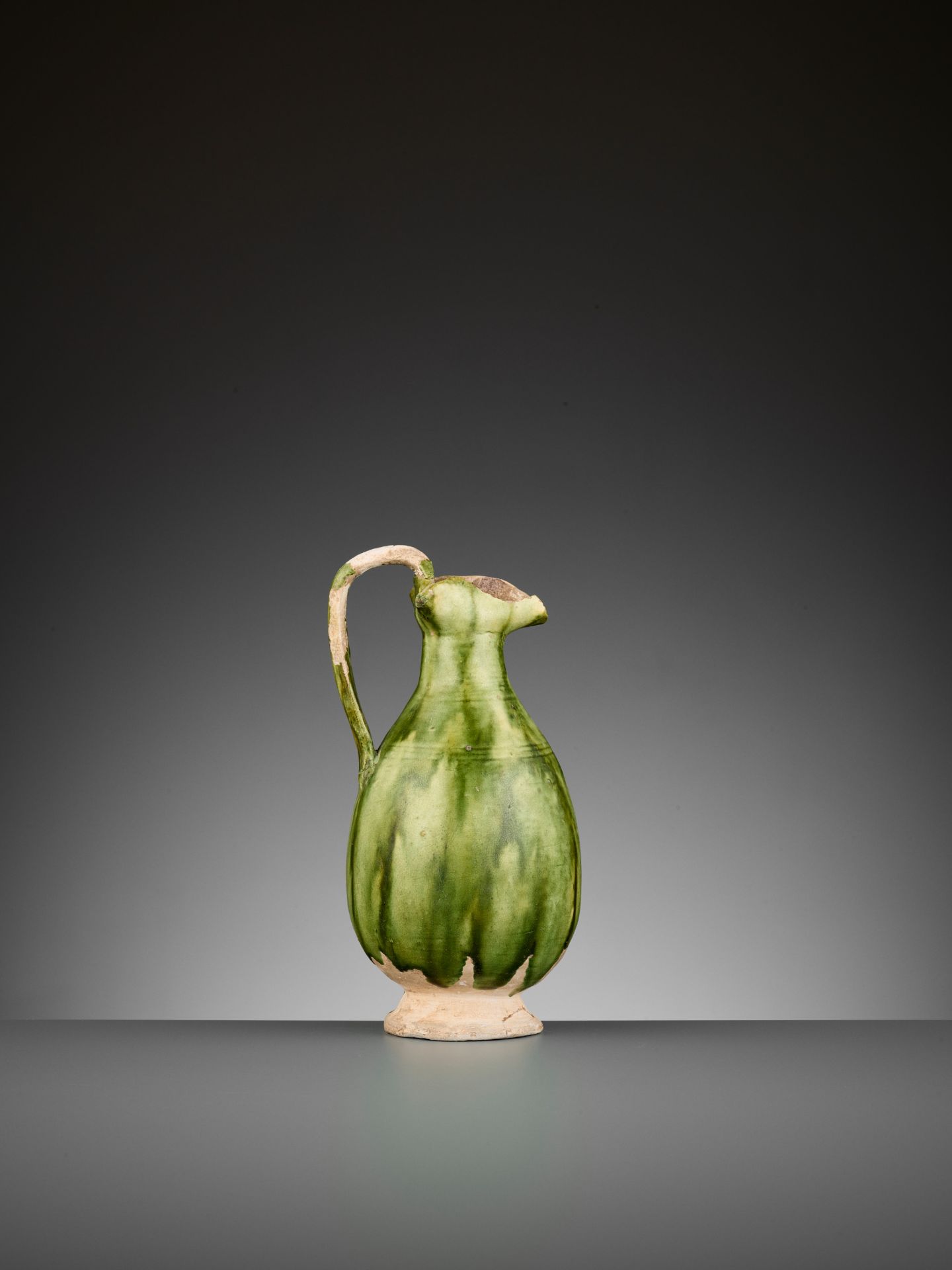 A GREEN-GLAZED EWER, TANG DYNASTY - Image 6 of 9