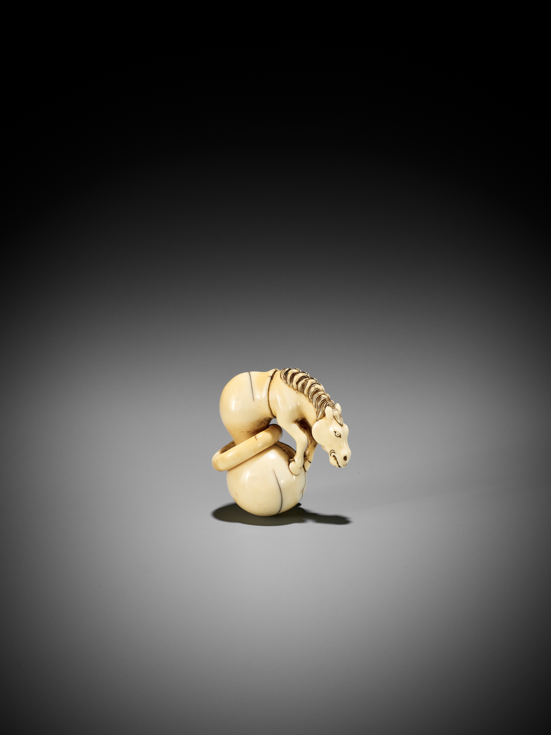 A GOOD IVORY NETSUKE OF CHOKARO'S HORSE EMERGING FROM A DOUBLE GOURD - Image 5 of 10