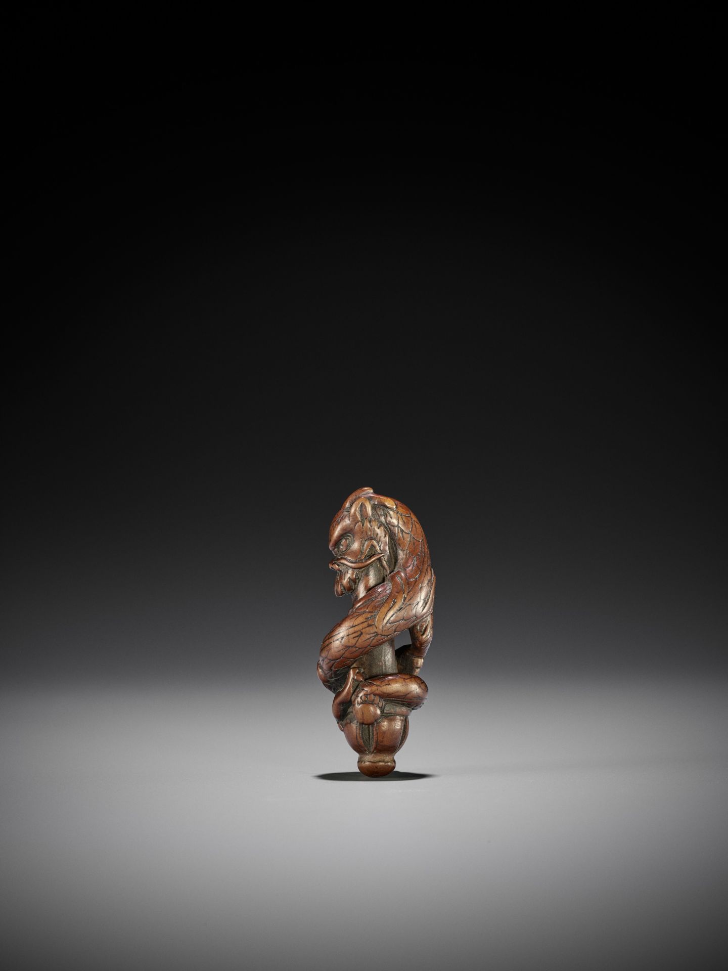 A RARE WOOD NETSUKE OF A DRAGON ON A KEN - Image 5 of 6